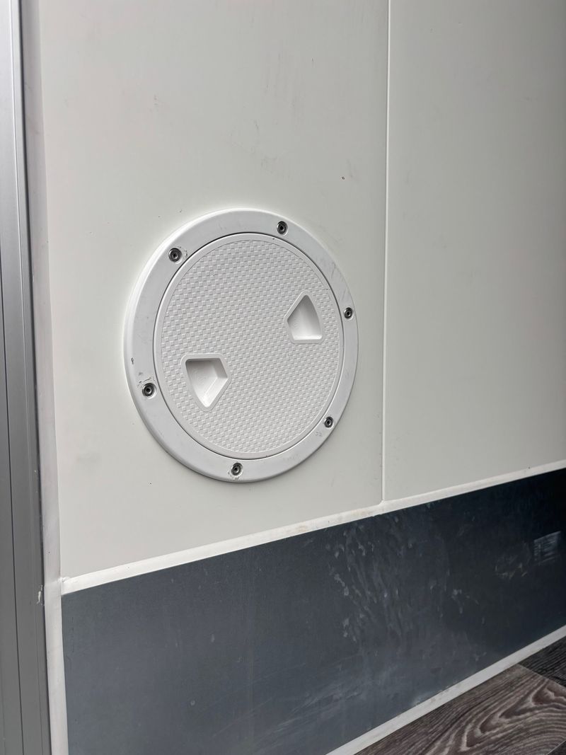 Python hole port in the trailer wall for running beer lines