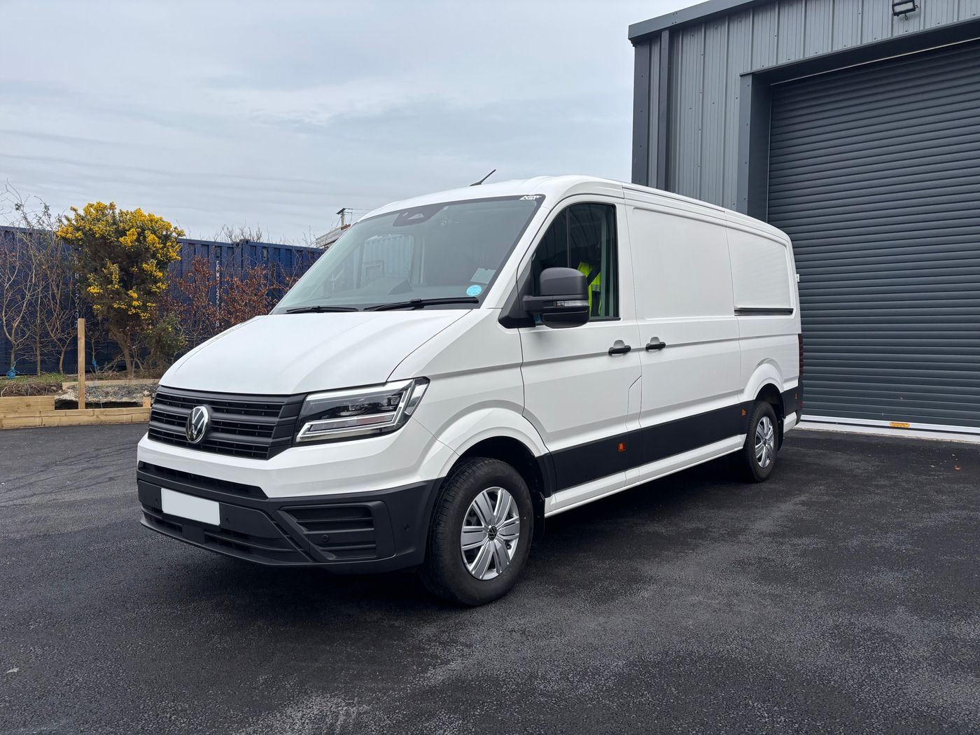Tryc's white Volkswagen Crafter van for towing and transport